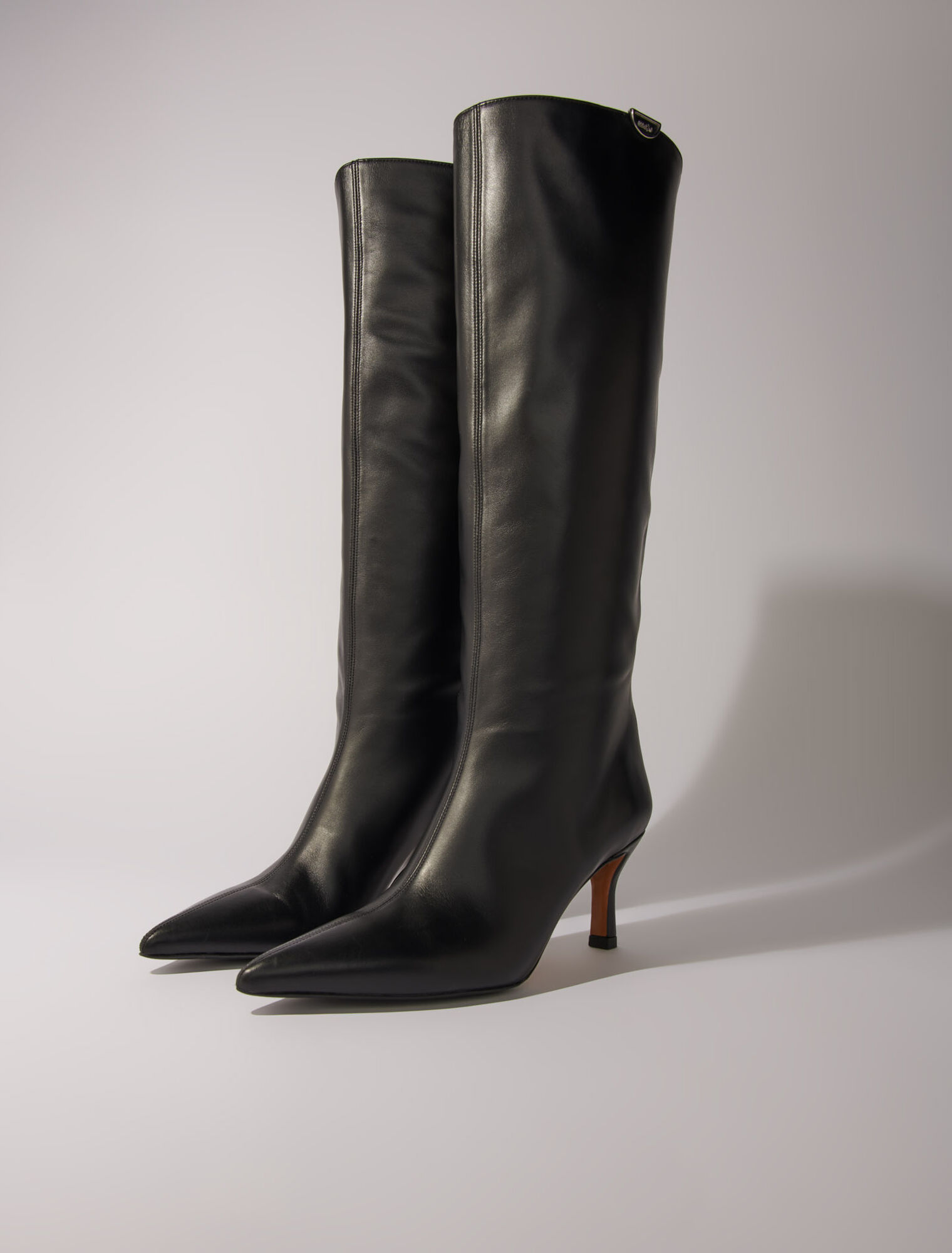 Pointed-toe leather boots