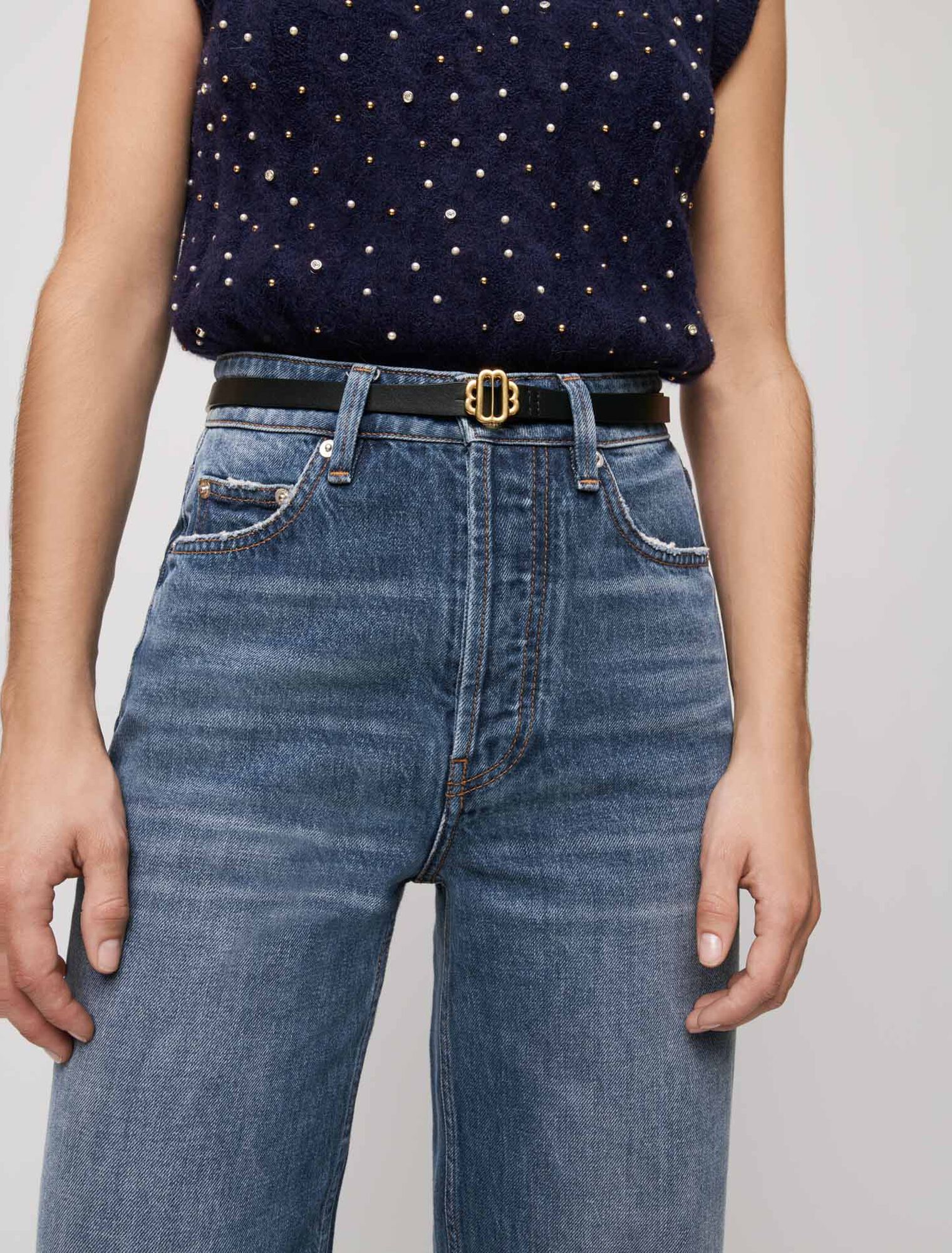 Narrow black leather belt gold buckle