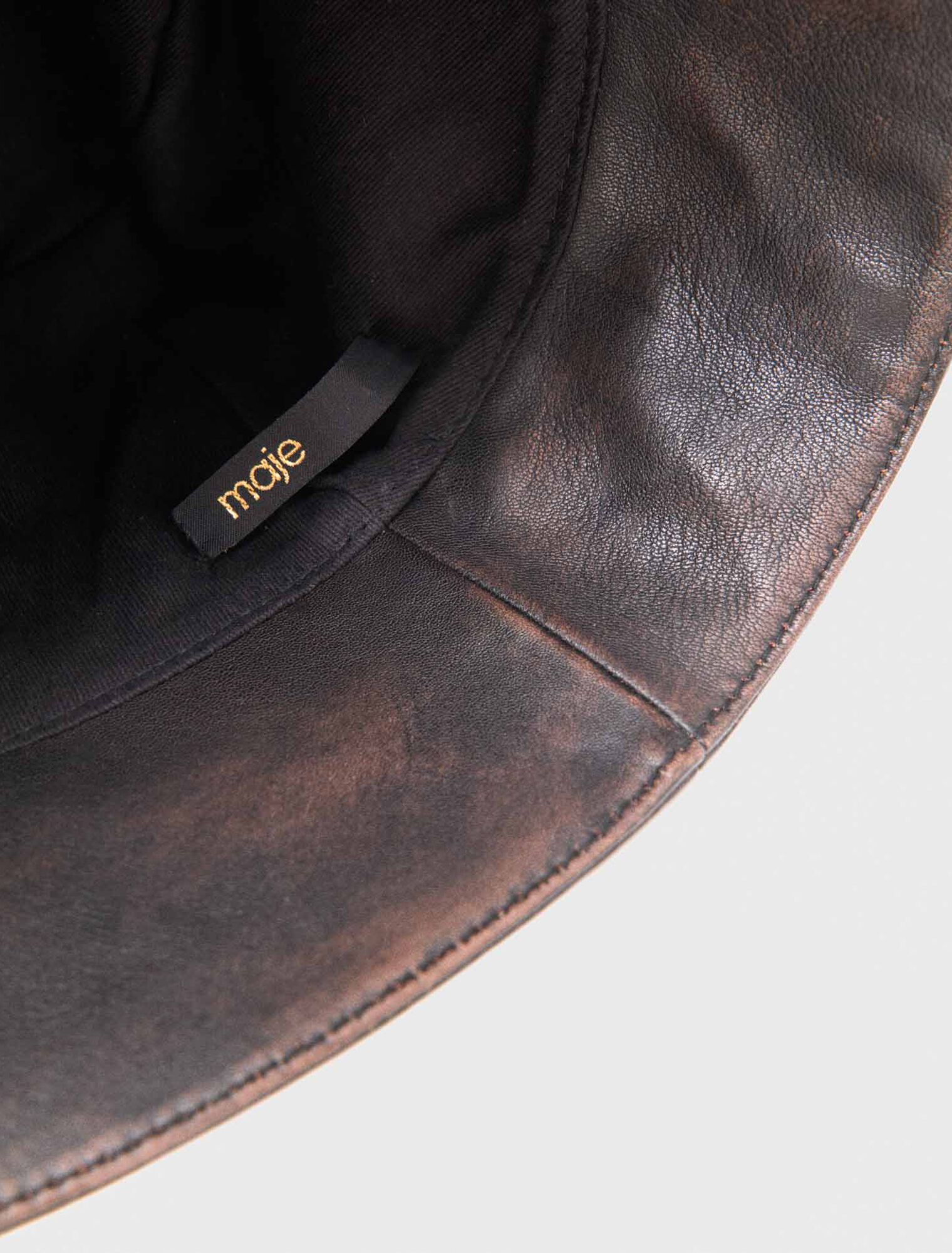 Distressed leather bucket hat