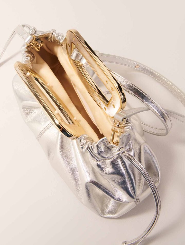 Metal handle metal leather clutch