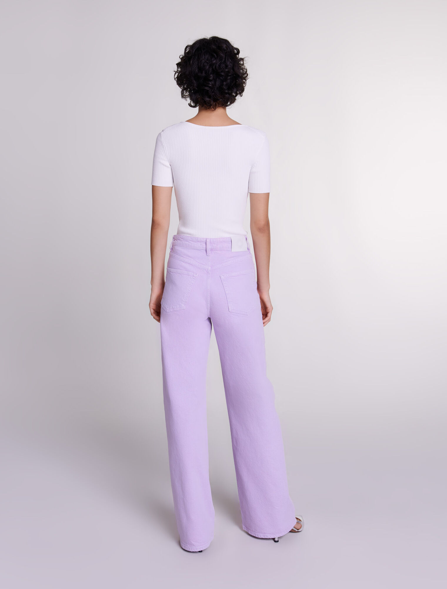 Cutaway knit top with jewellery