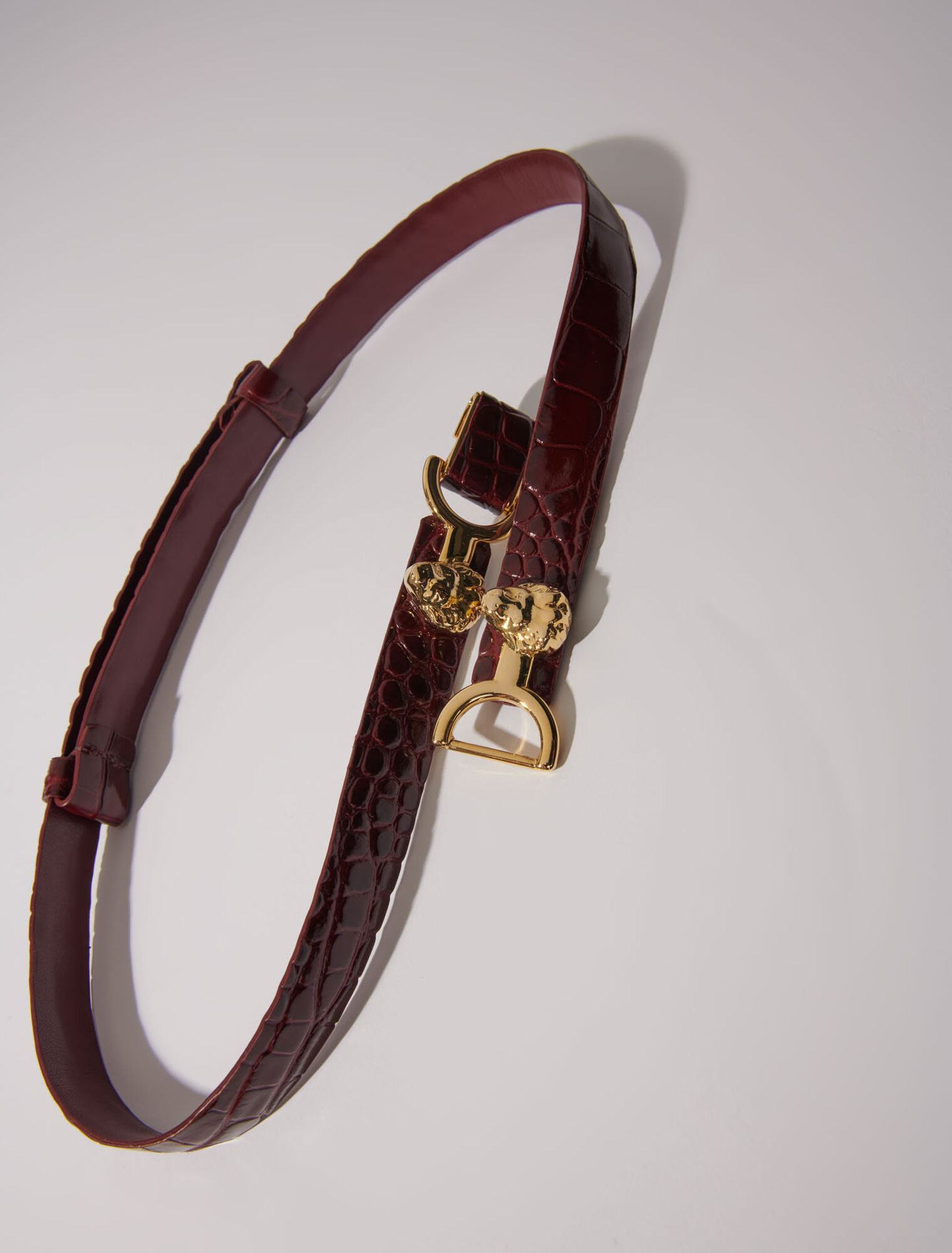 Thin leather belt with lion bit