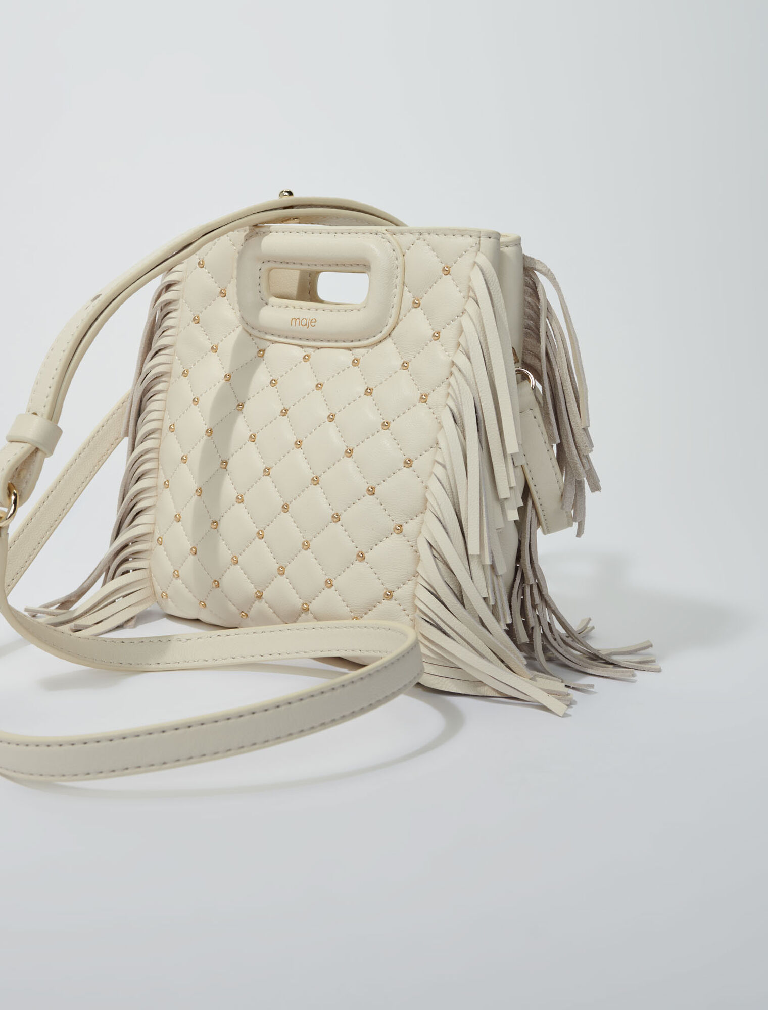 Studded M quilted leather mini bag