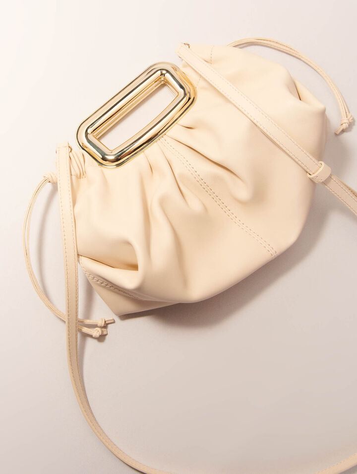 Metal handle leather clutch