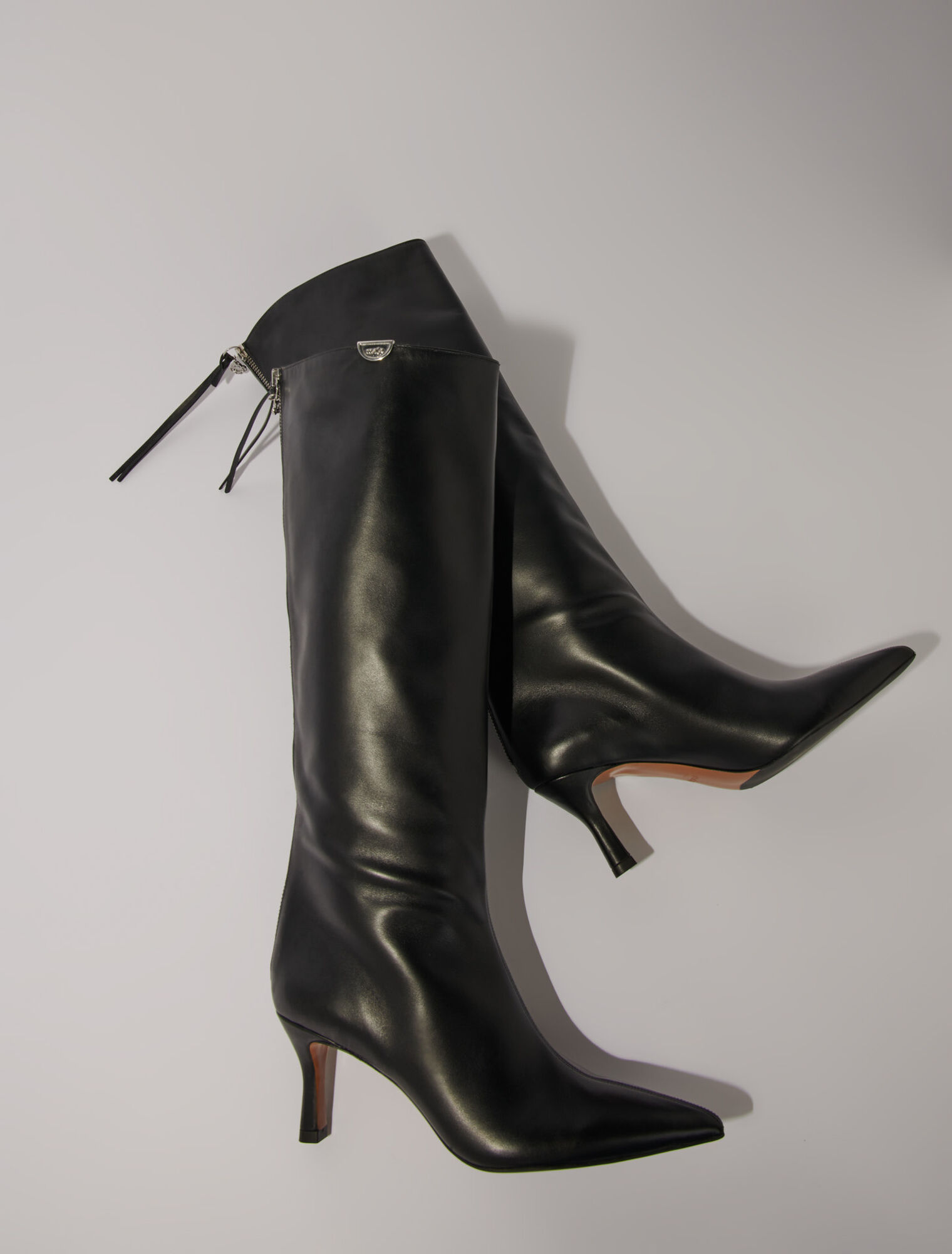 Pointed-toe leather boots