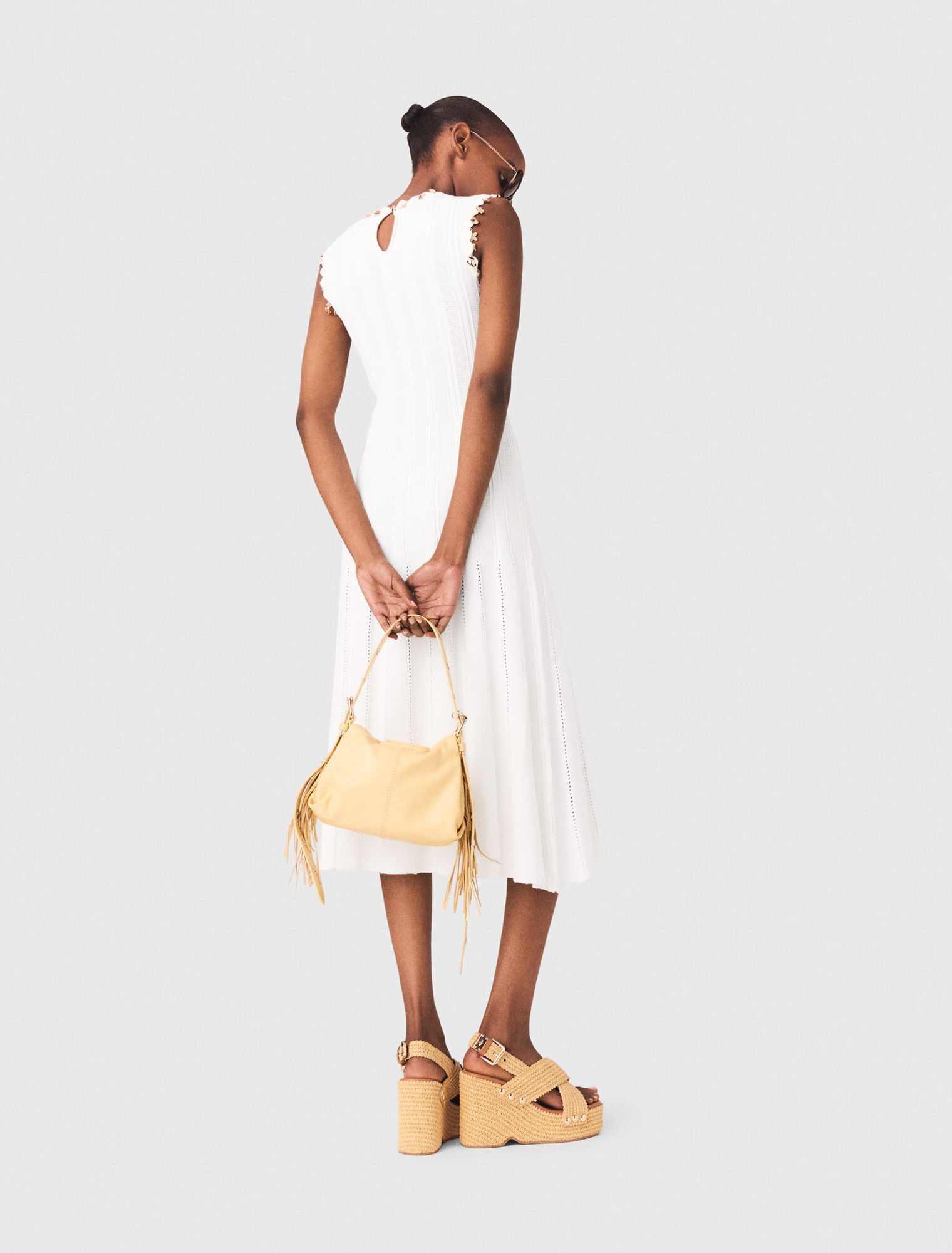 Knit dress with gold jewellery