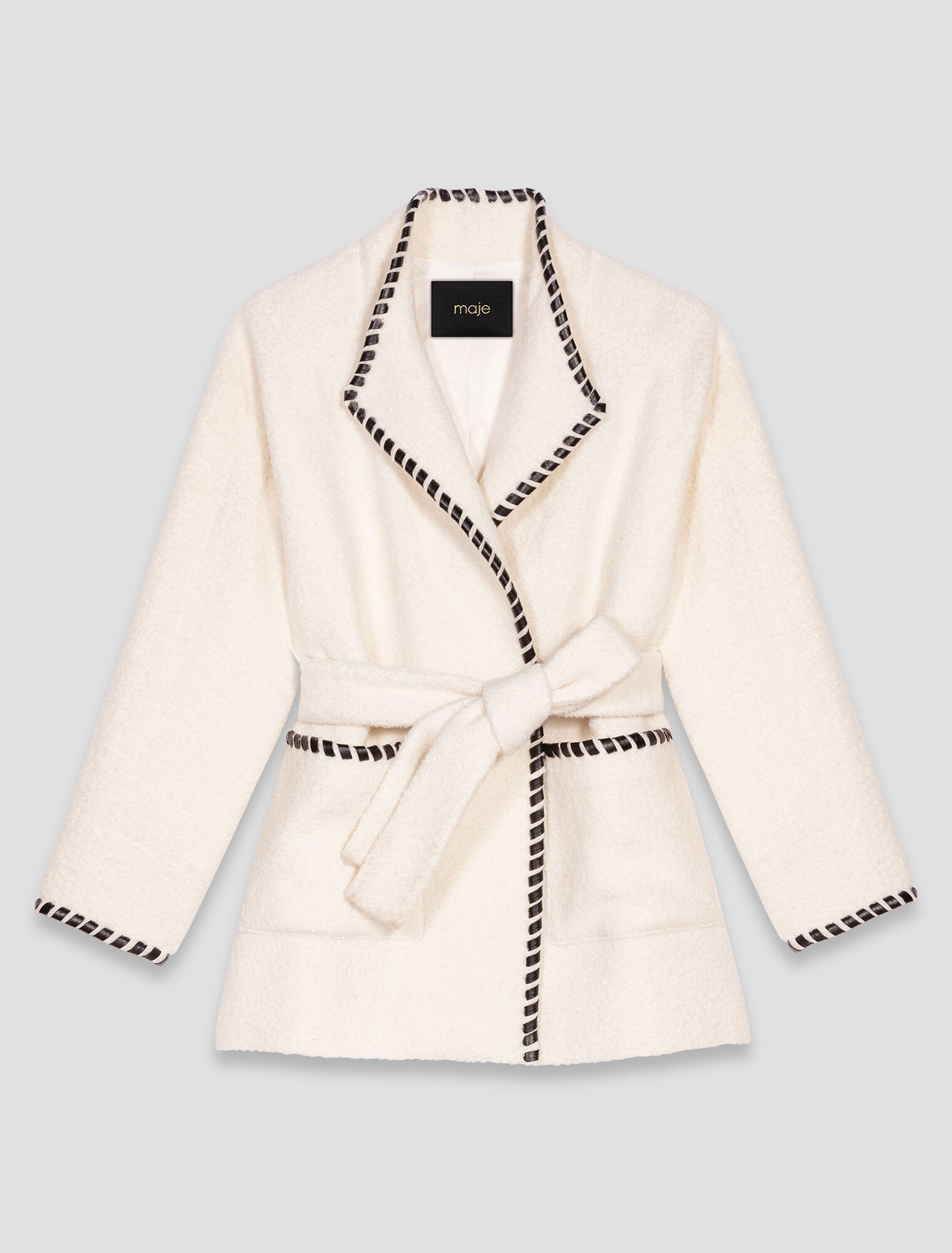 Lined coat with contrasting ribbon