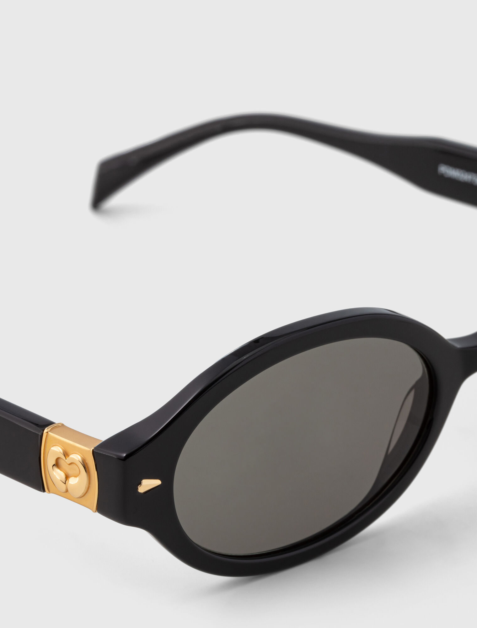 Oval acetate glasses