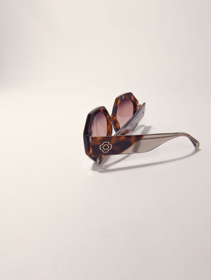 Round acetate glasses