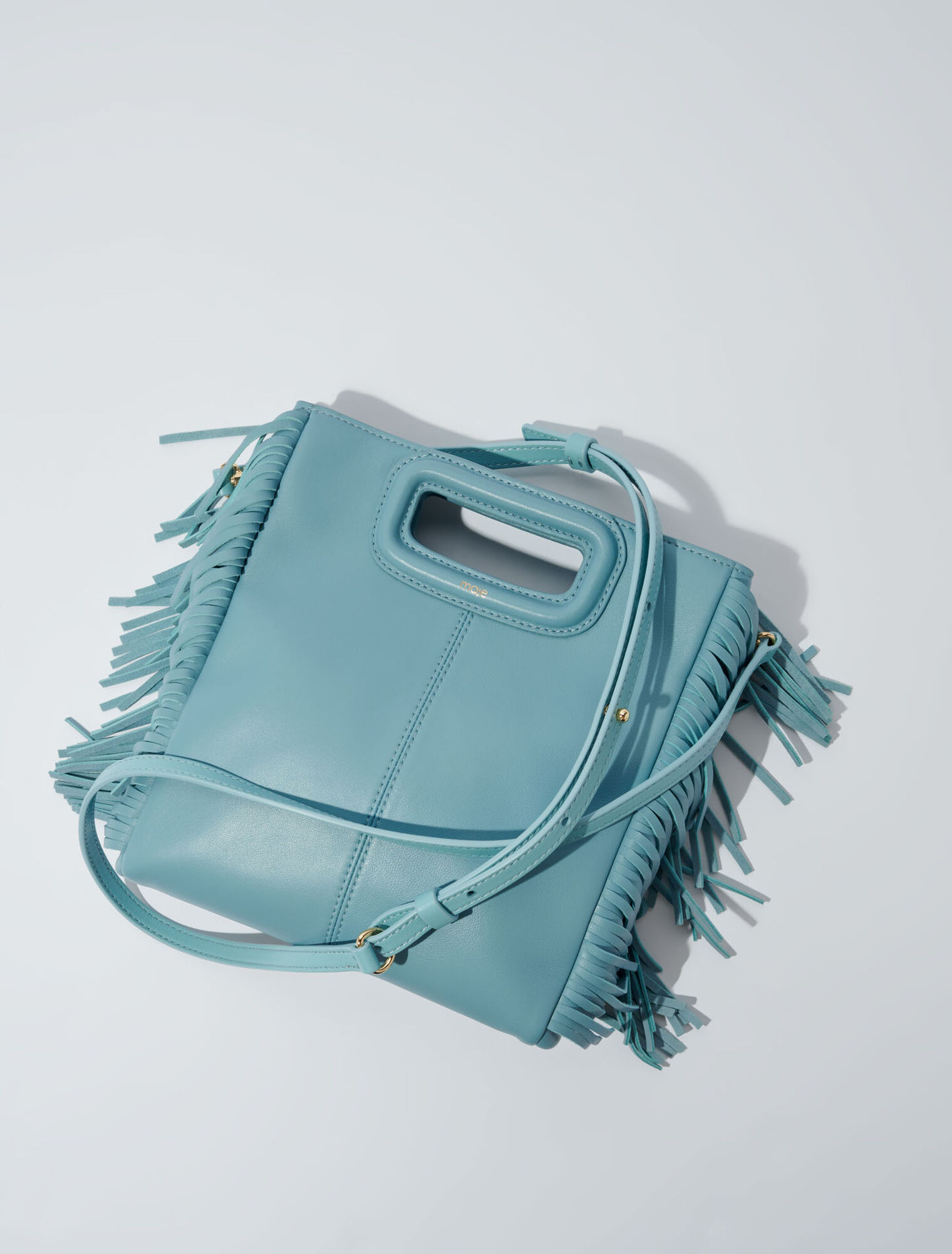 Smooth leather M bag with fringing