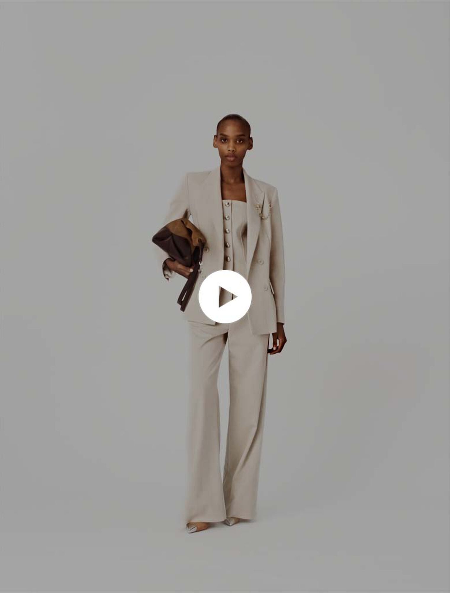 Suit jacket with brooch