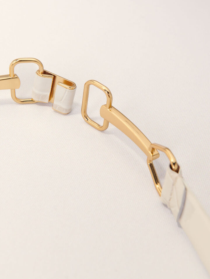 Leather belt with horse bit buckle