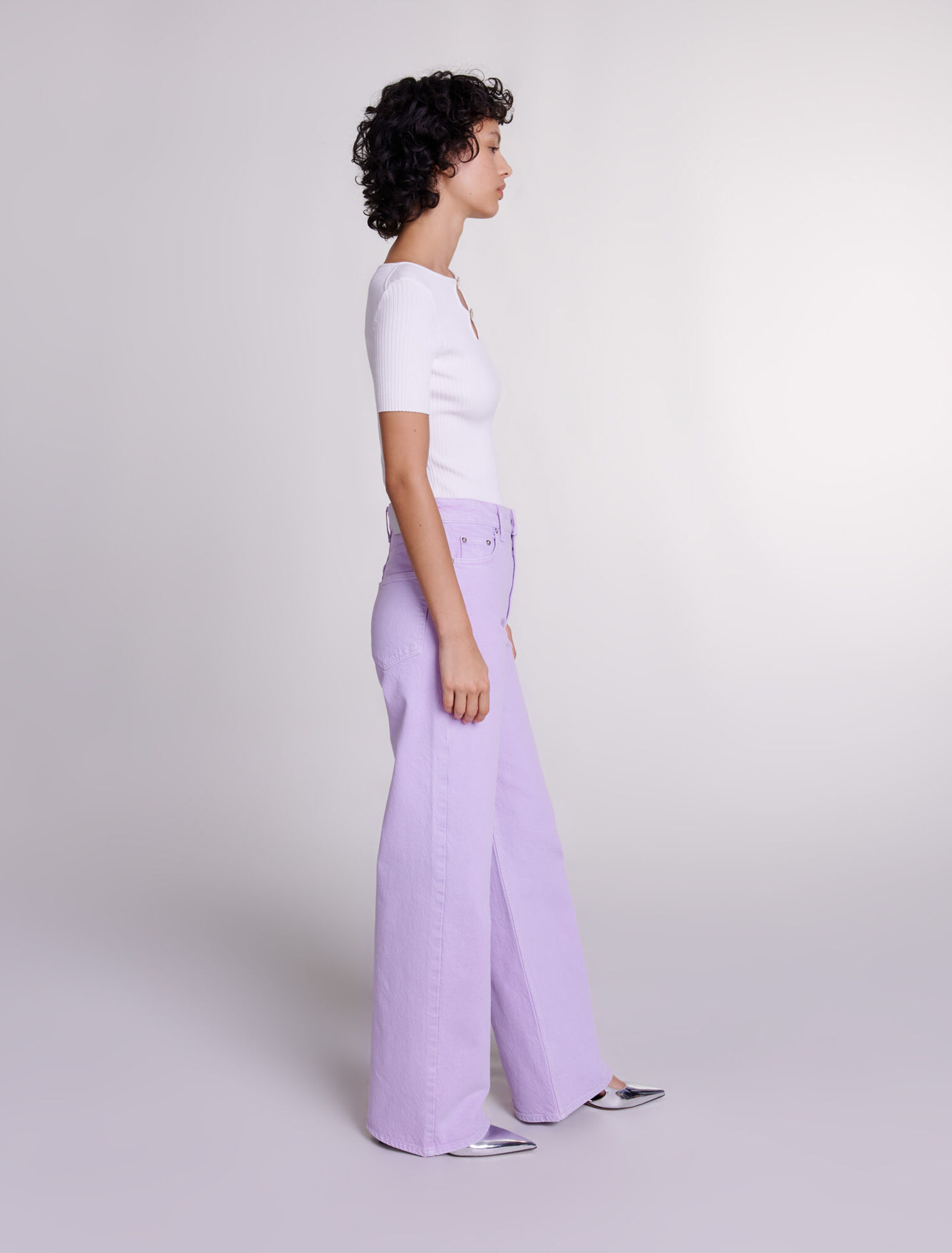 Cutaway knit top with jewellery