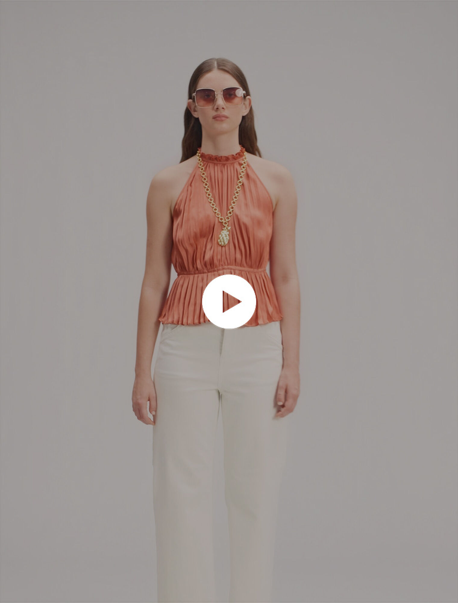Sleeveless pleated top