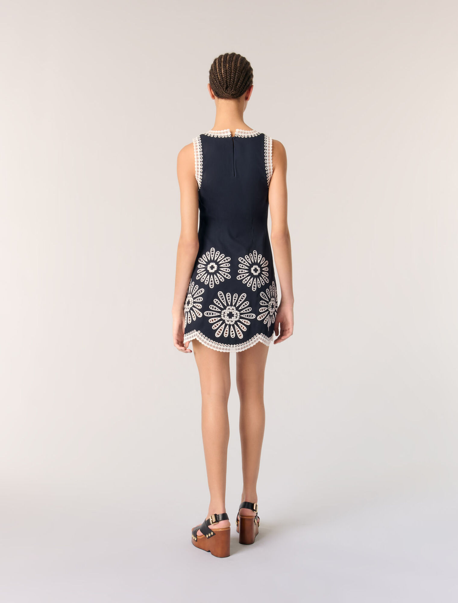 Short dress with crochet details