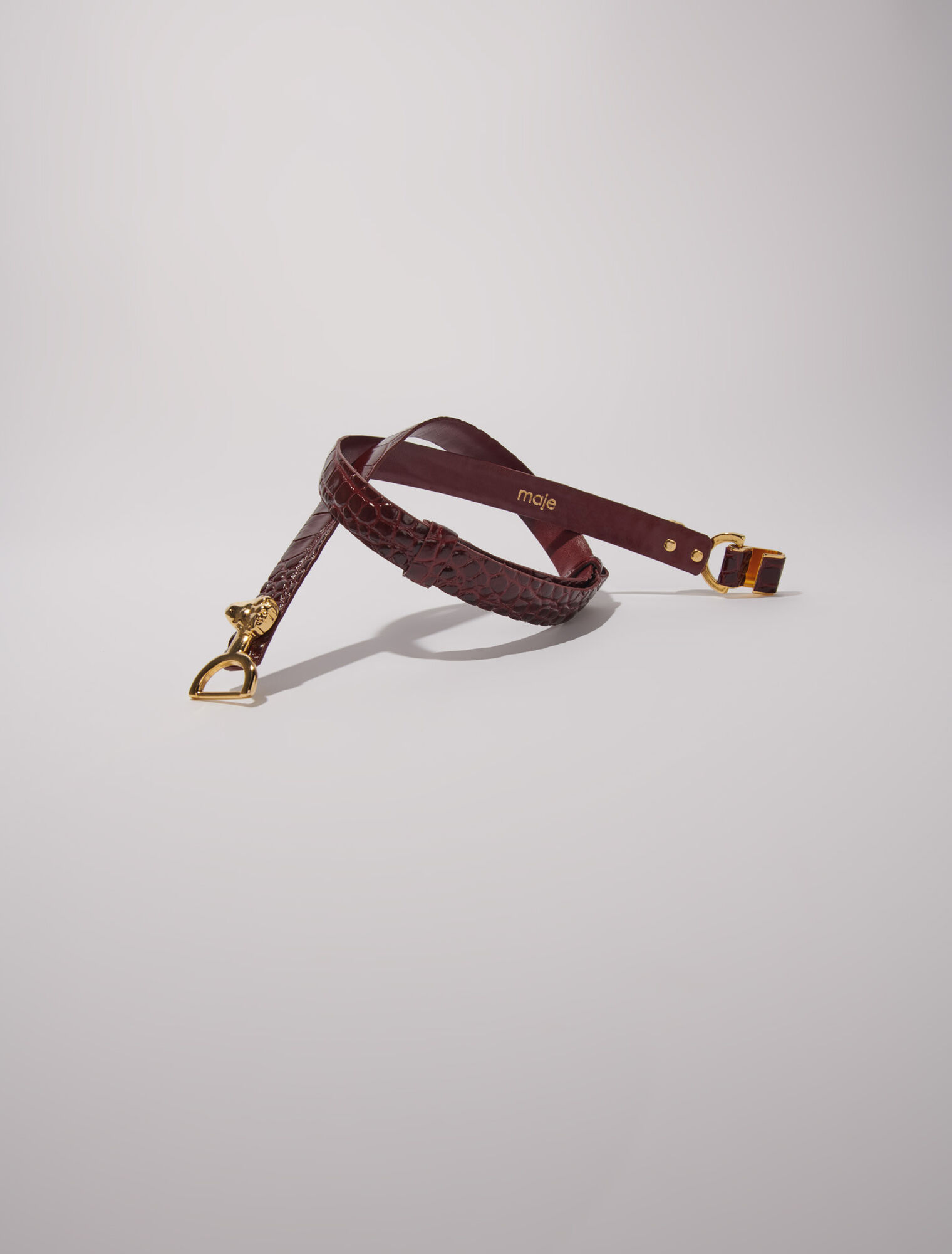 Thin leather belt with lion bit