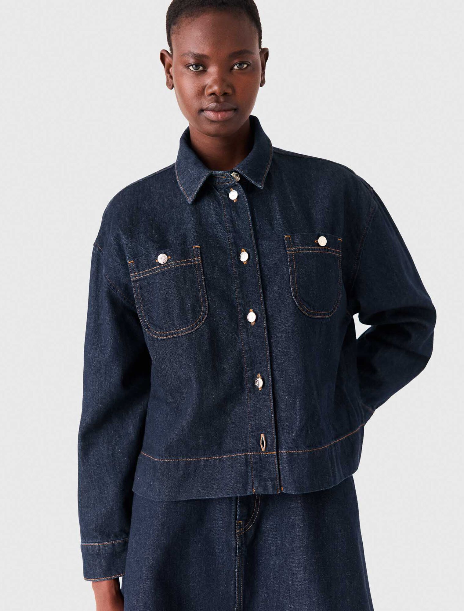 Denim shirt with pussy bow