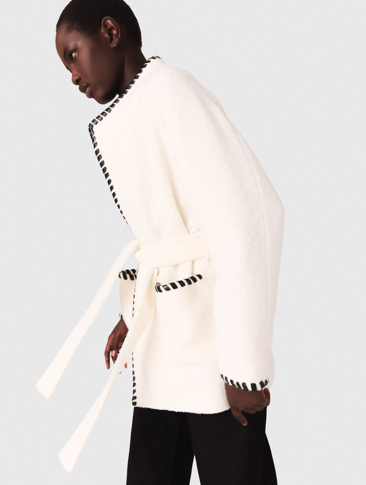 Lined coat with contrasting ribbon