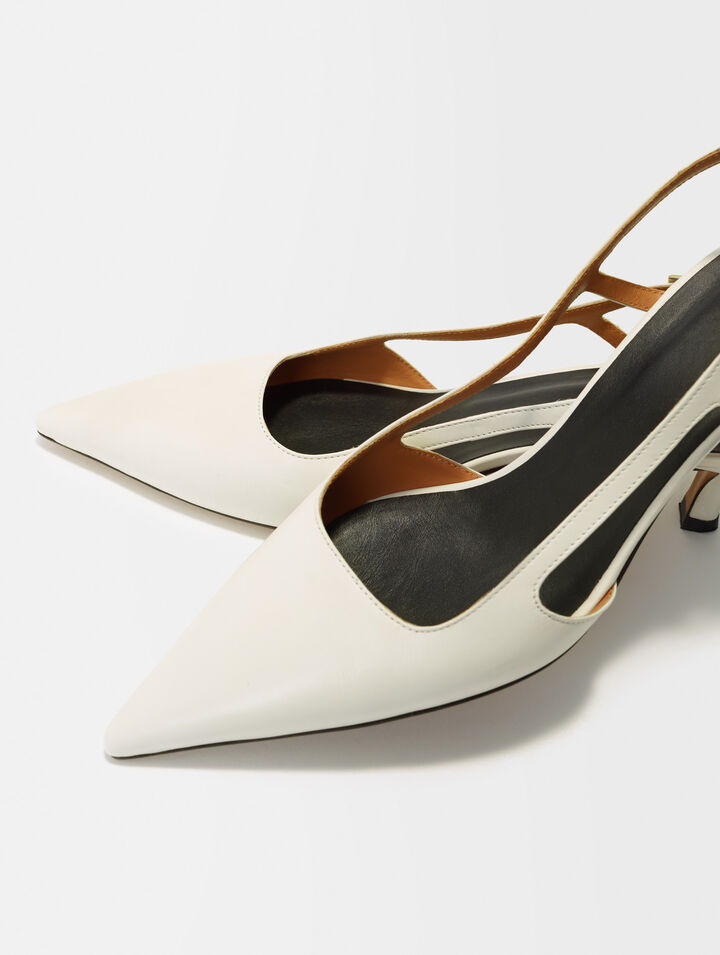 Pointed-toe pumps with straps