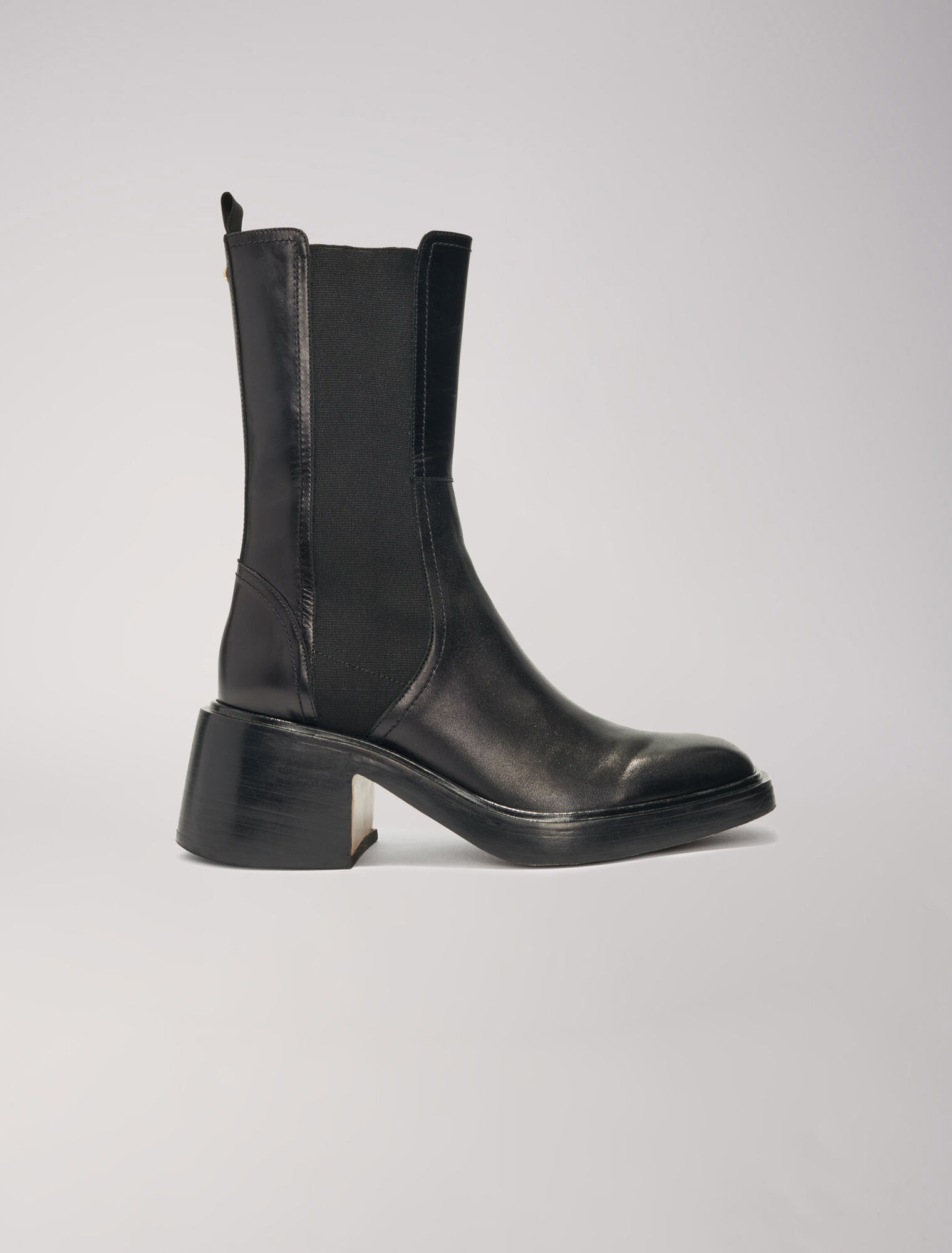 Black leather ankle boots and square toe