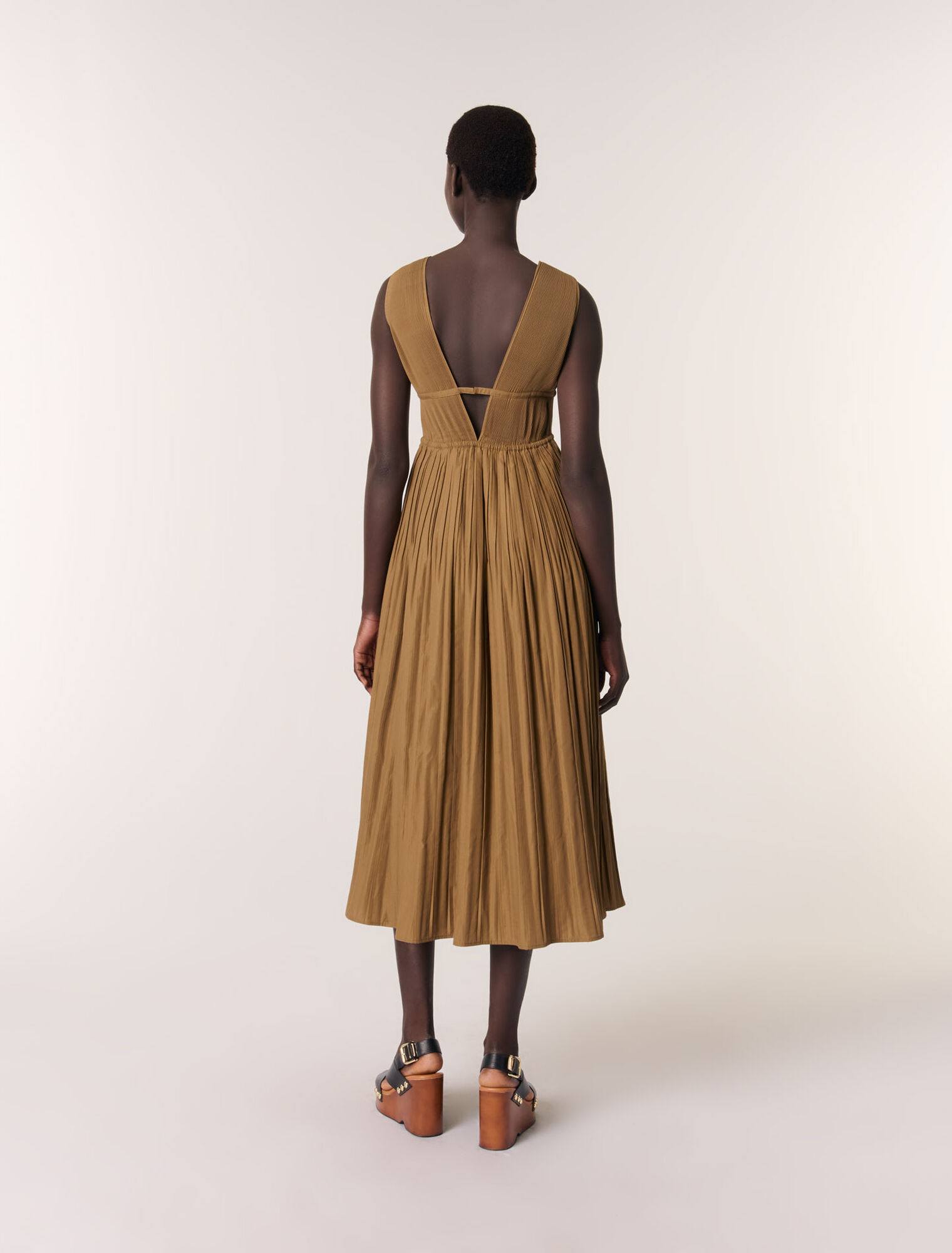 Jewellery neckline pleated dress
