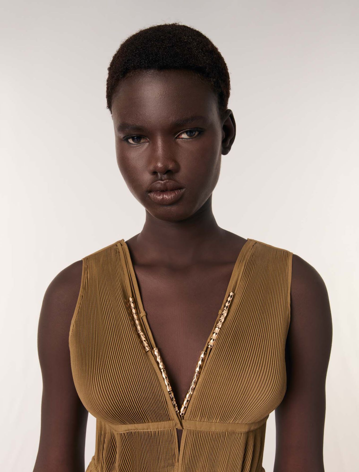 Jewellery neckline pleated dress