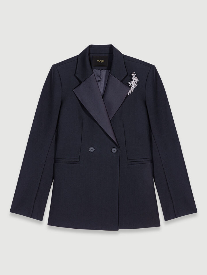 Suit jacket with brooch