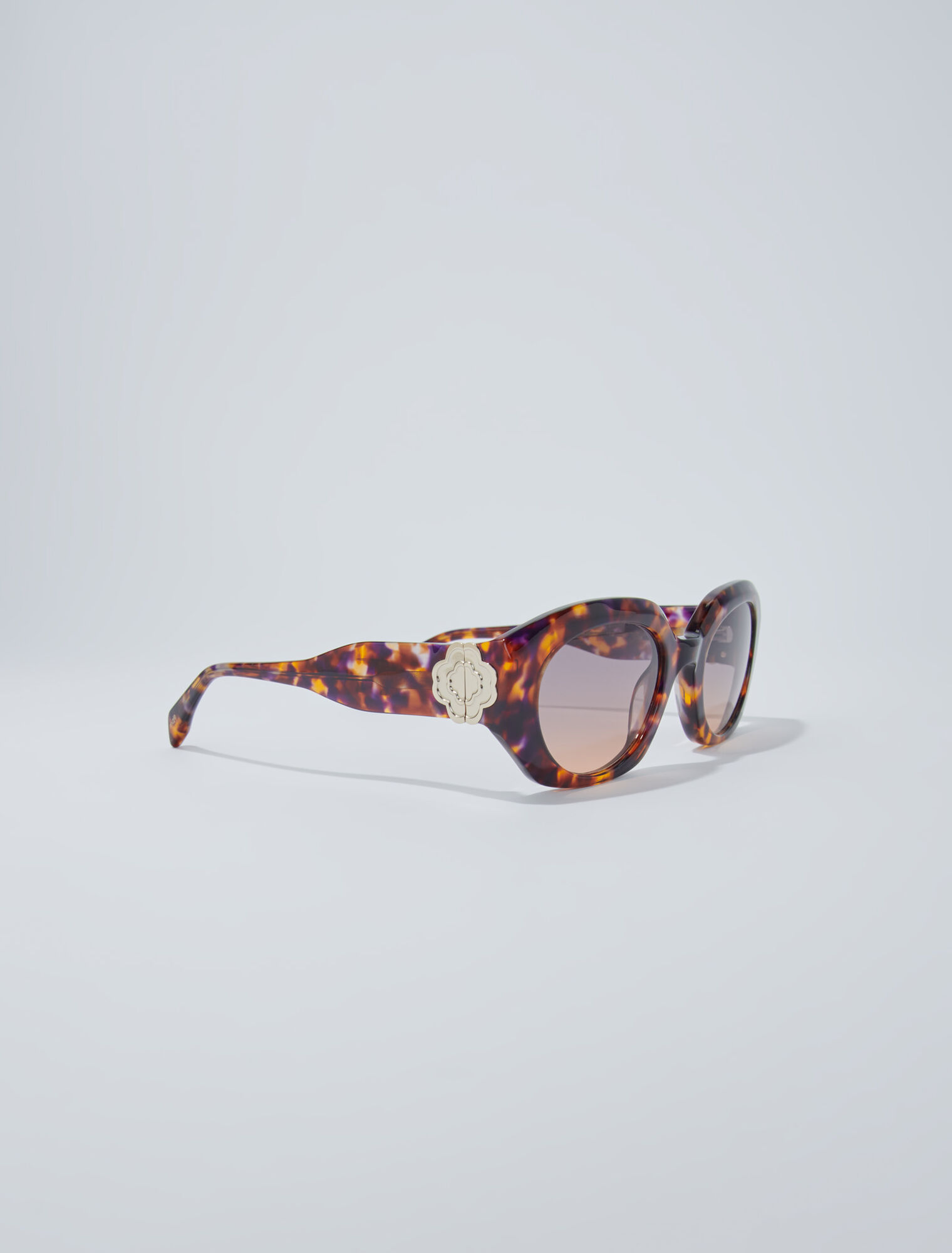 Round acetate glasses