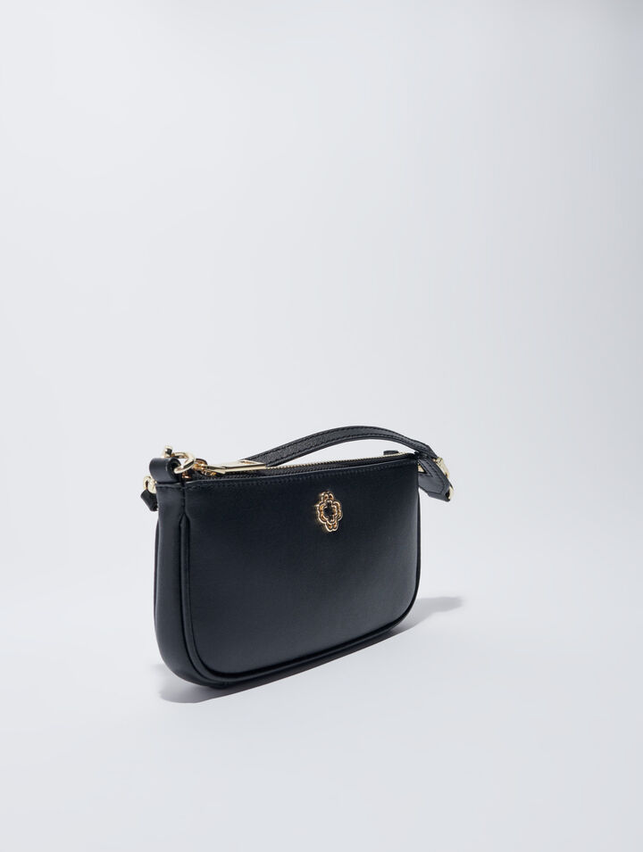 Small leather clutch bag