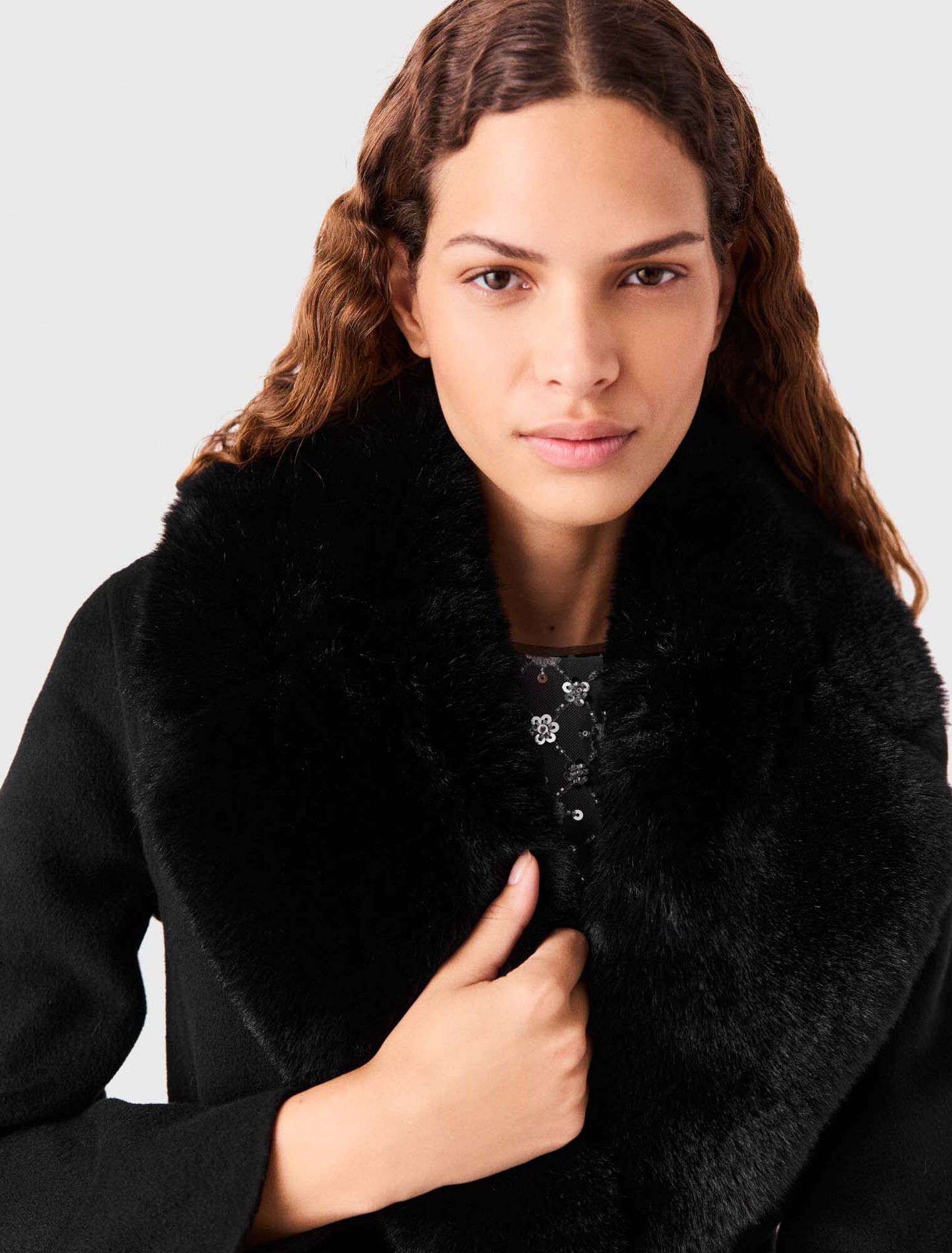 Long coat with faux fur collar