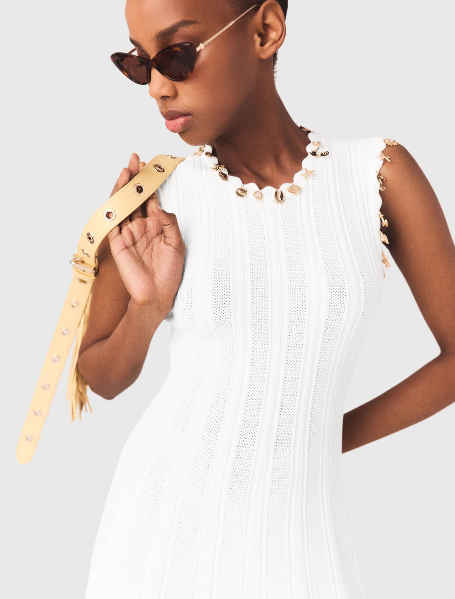 Knit dress with gold jewellery