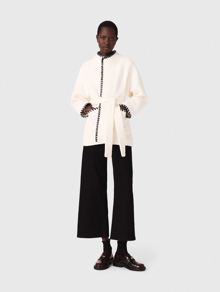 Lined coat with contrasting ribbon