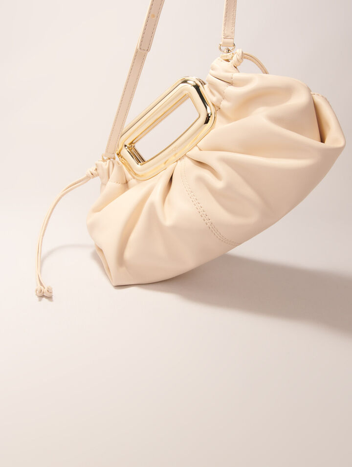 Metal handle leather clutch