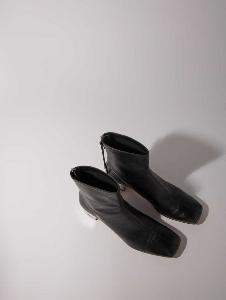 Square-toed leather boots