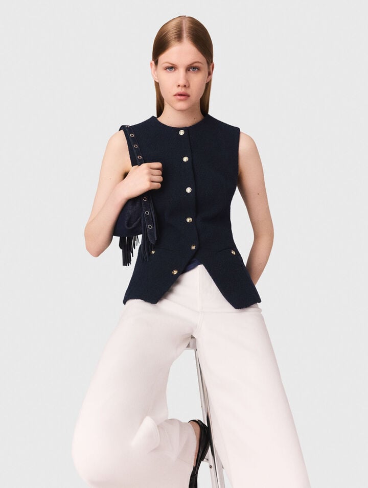 Long sleeveless tweed jacket