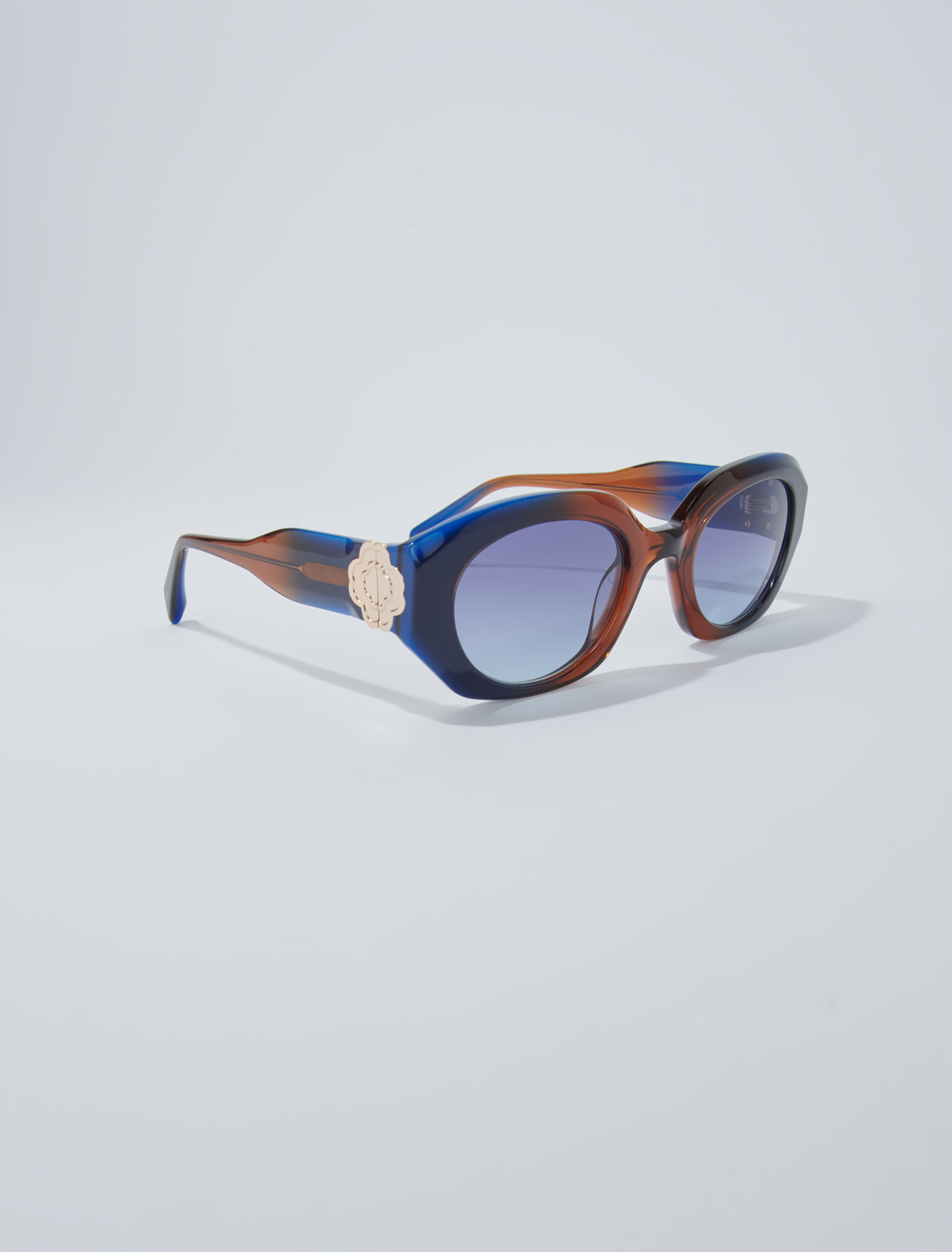 Round acetate glasses