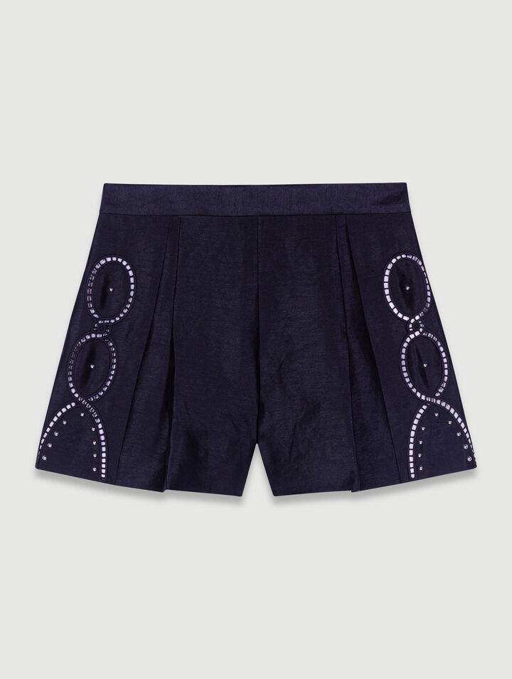 Openwork linen shorts with rivets