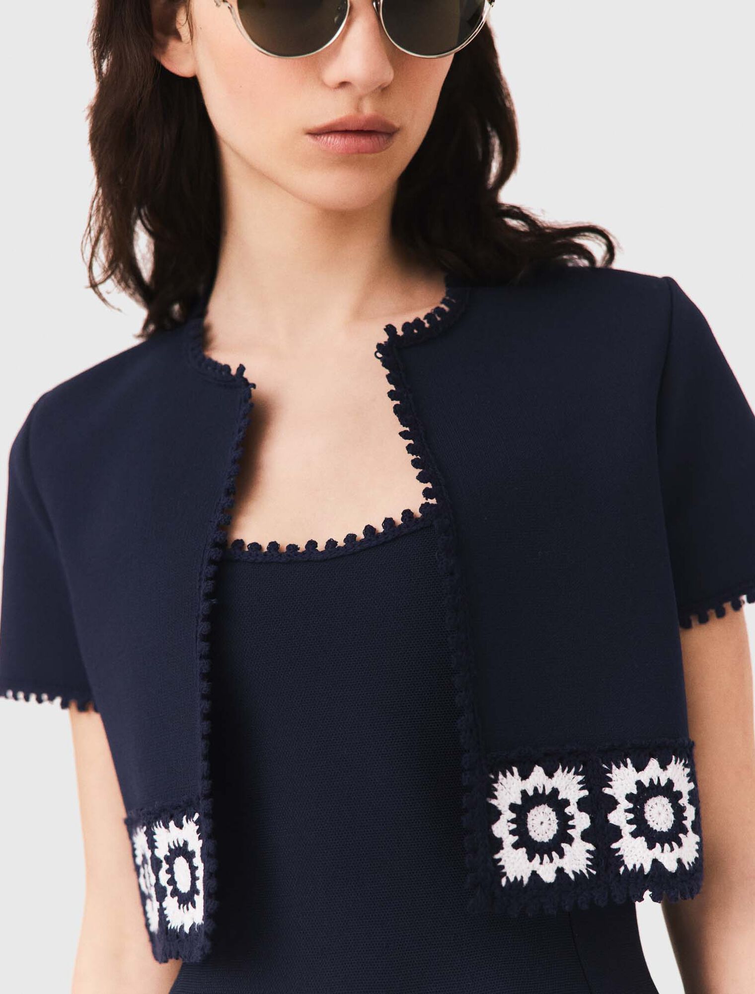 Cardigan with crochet panels