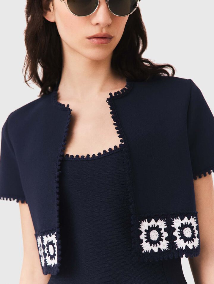Cardigan with crochet panels