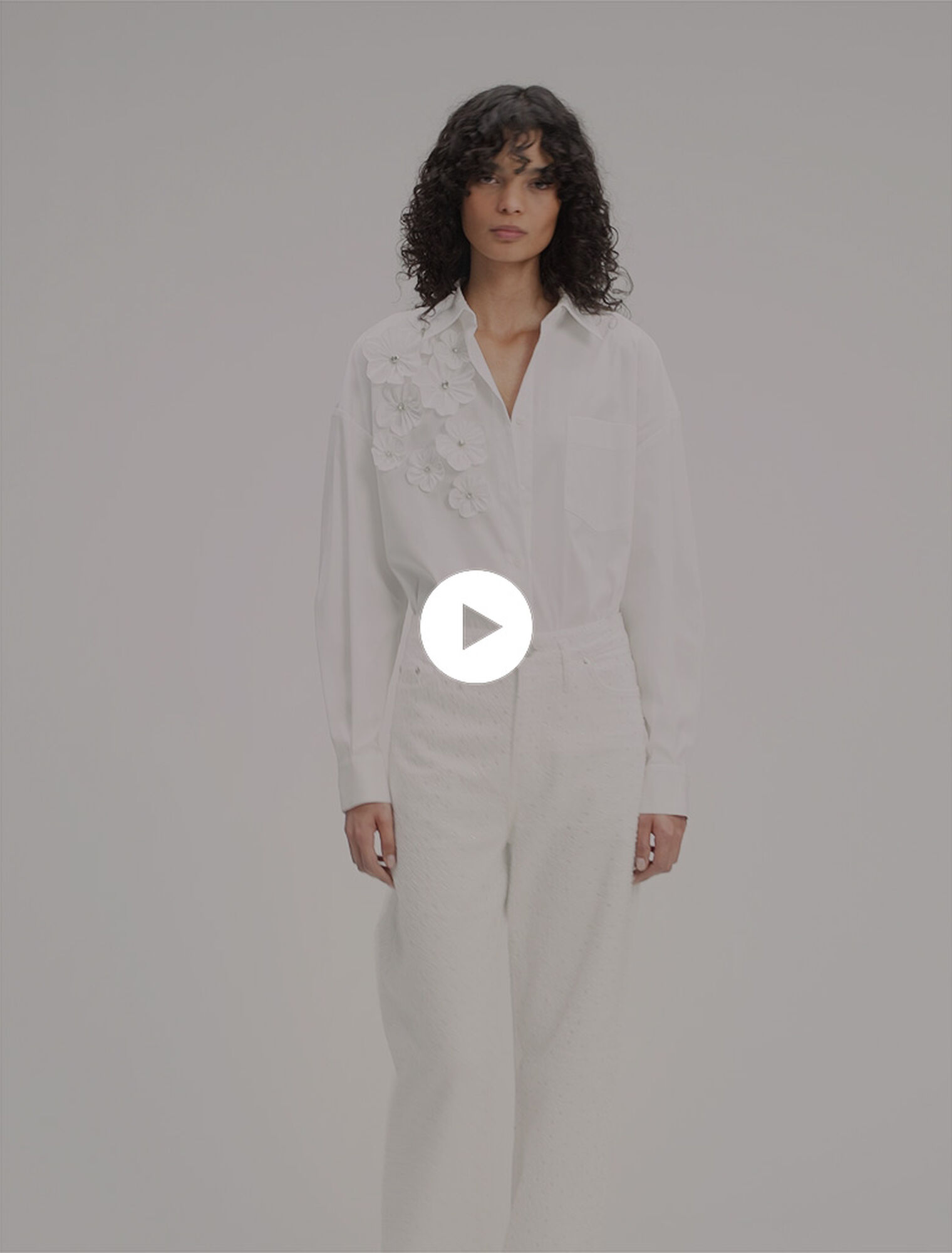 Long shirt with embroidered flowers