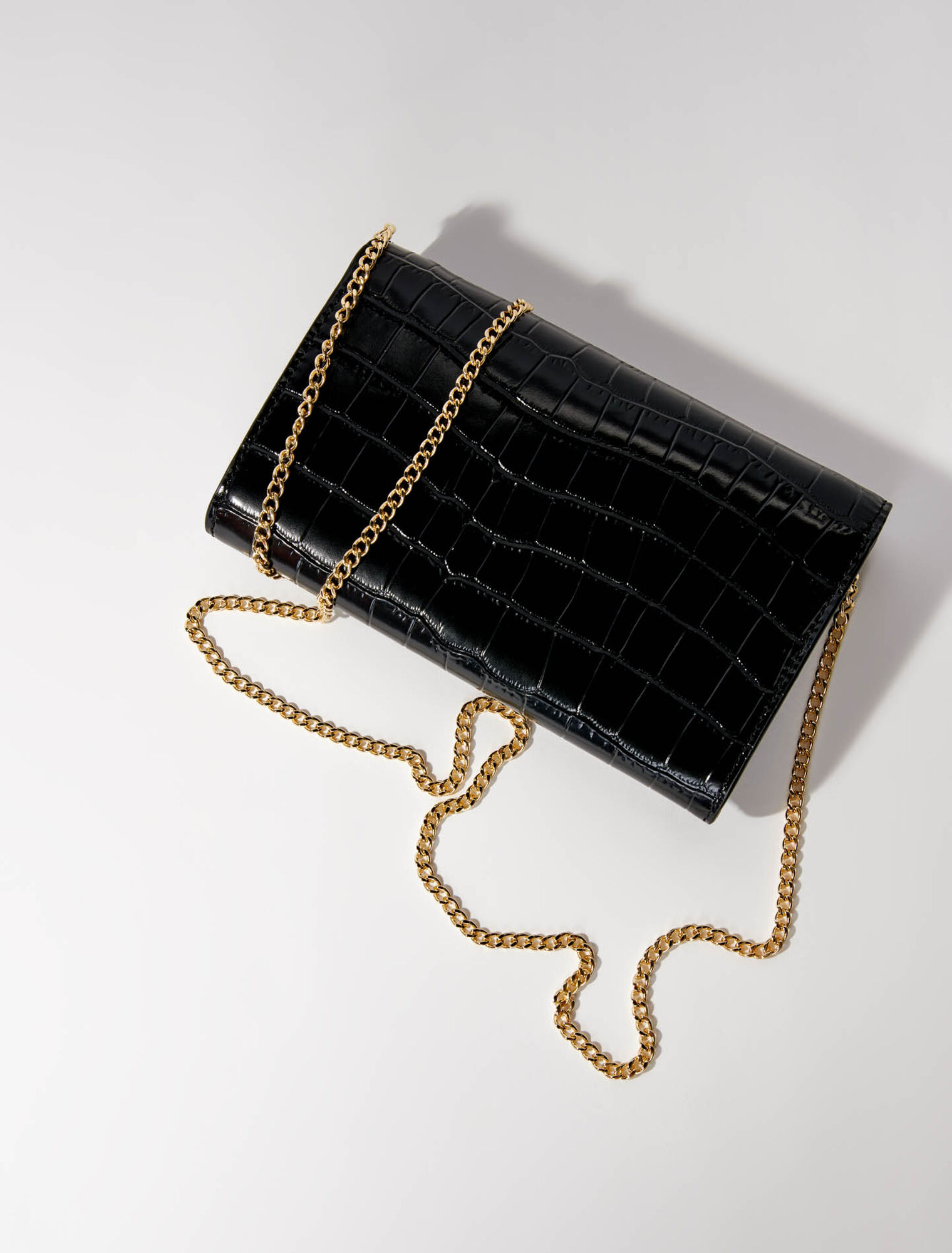 Croc-effect embossed leather bag