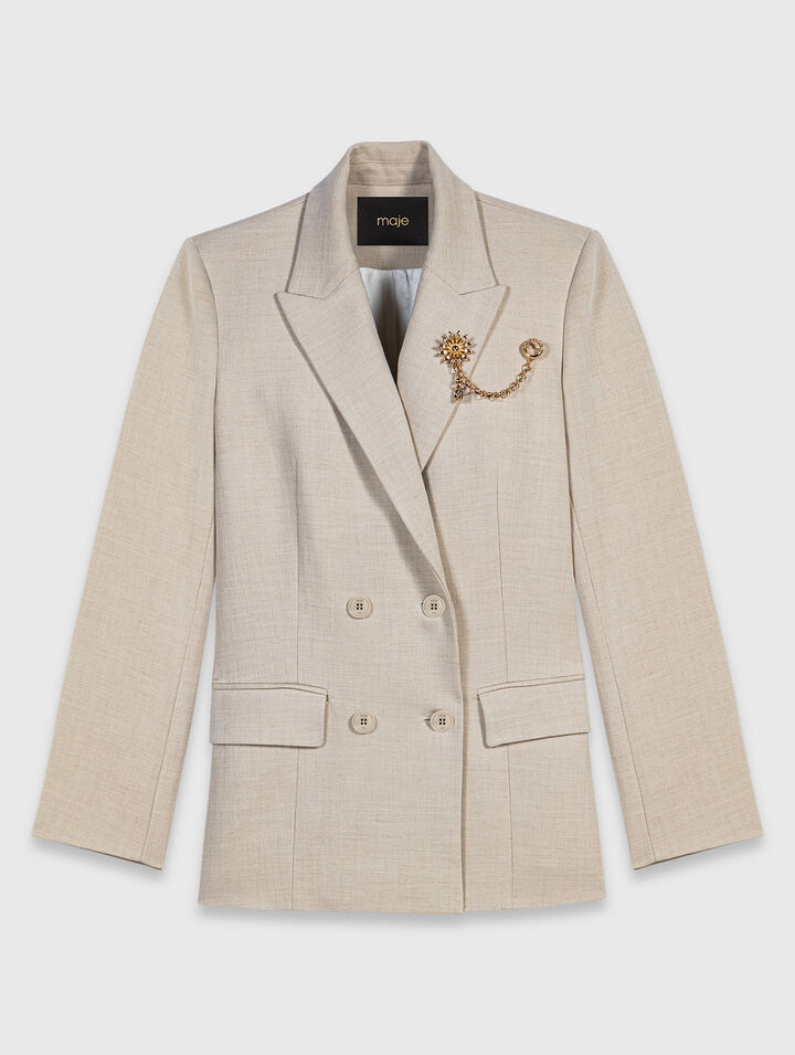 Suit jacket with brooch