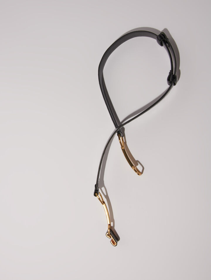 Leather belt with horse bit buckle