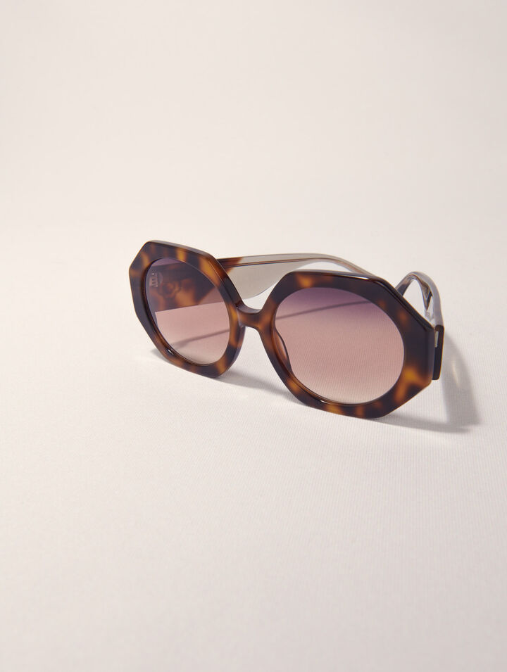 Round acetate glasses