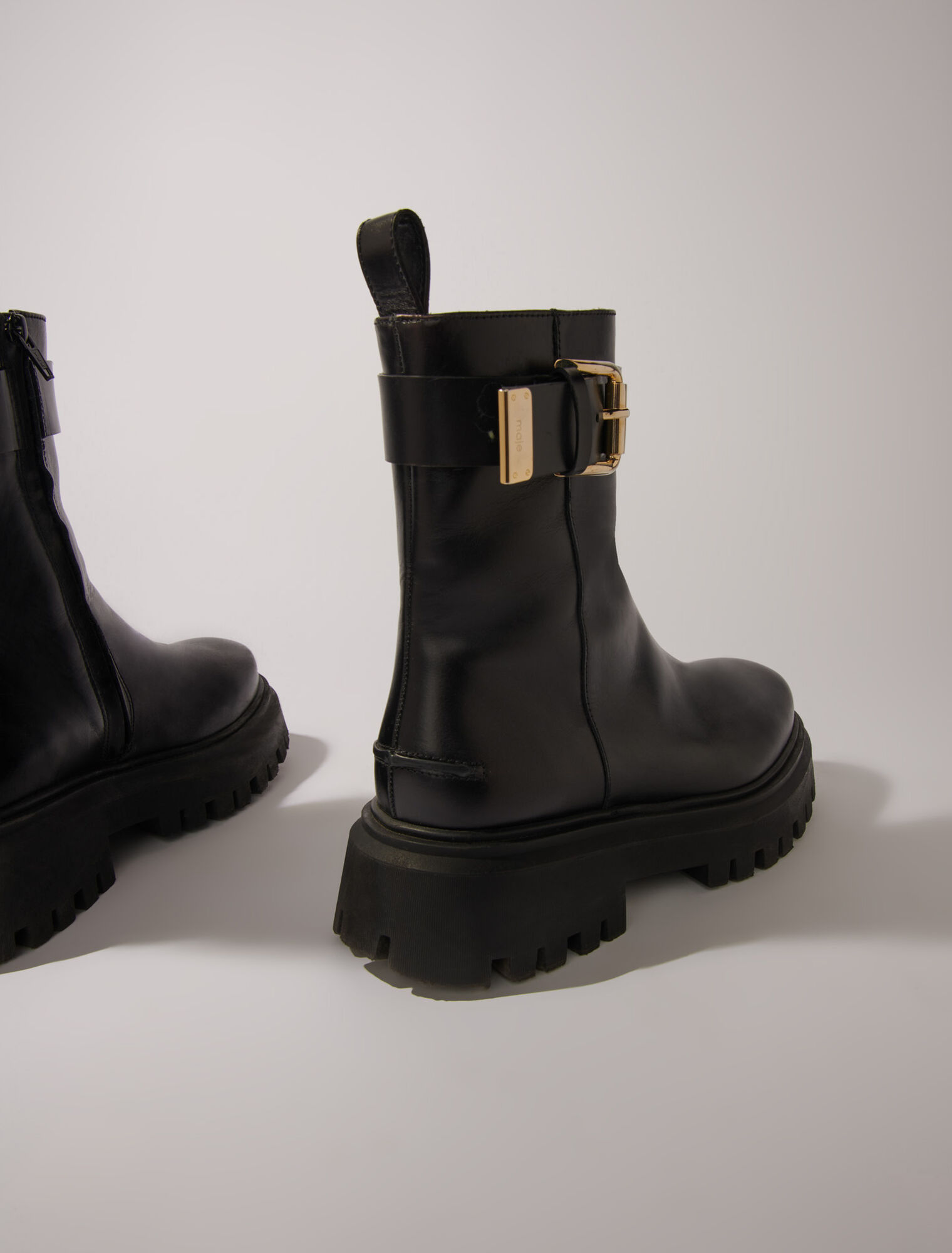 Leather ankle boots with buckles