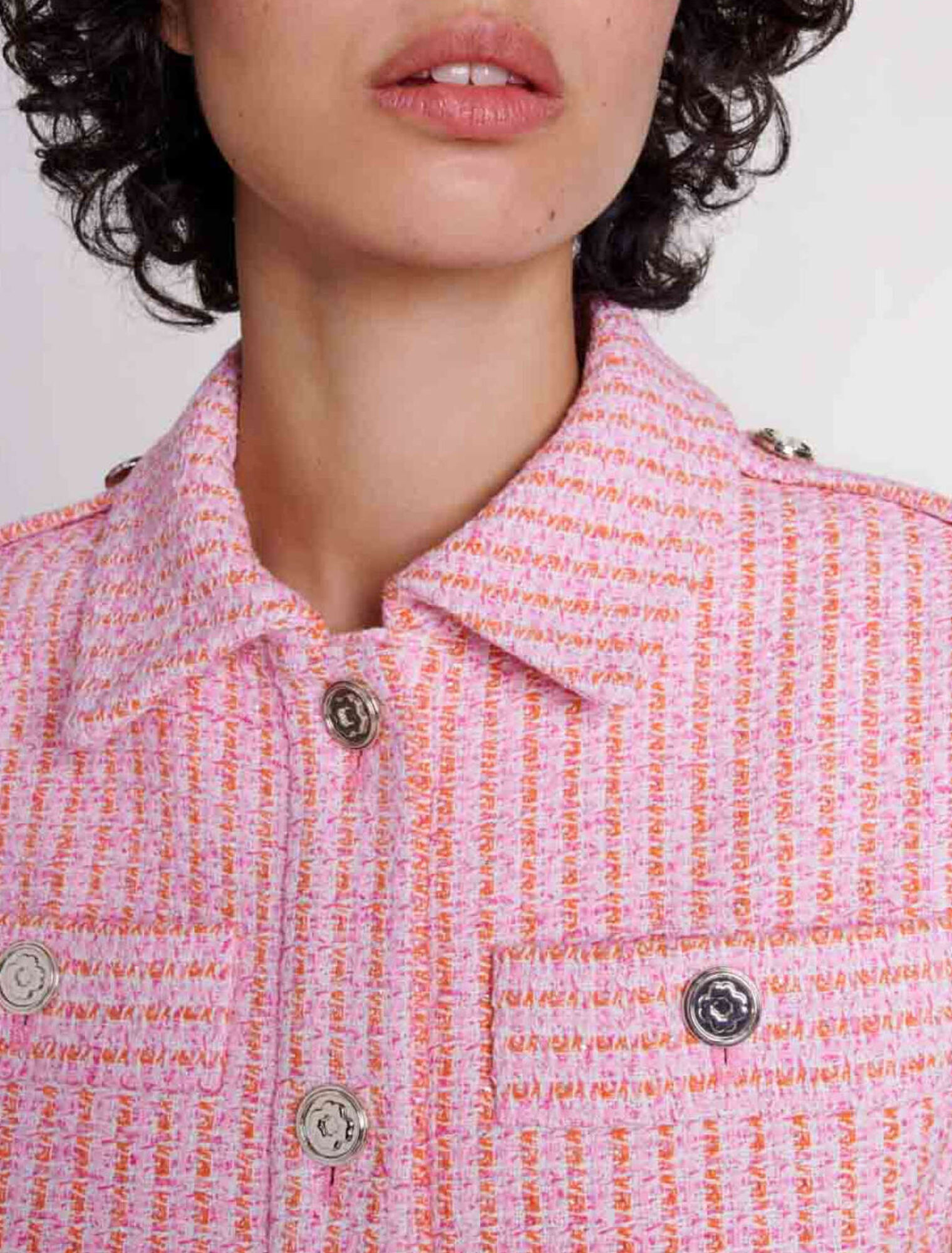 Sleeveless tweed jacket