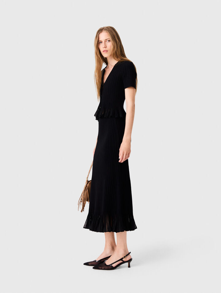 Knit skirt with peplum hem