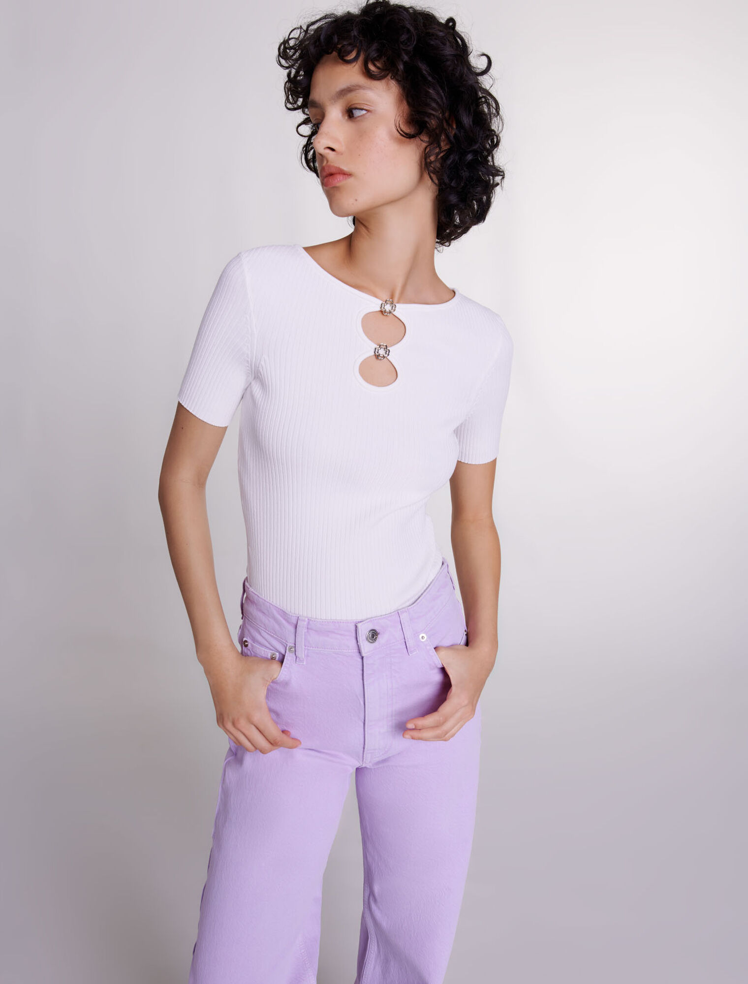 Cutaway knit top with jewellery