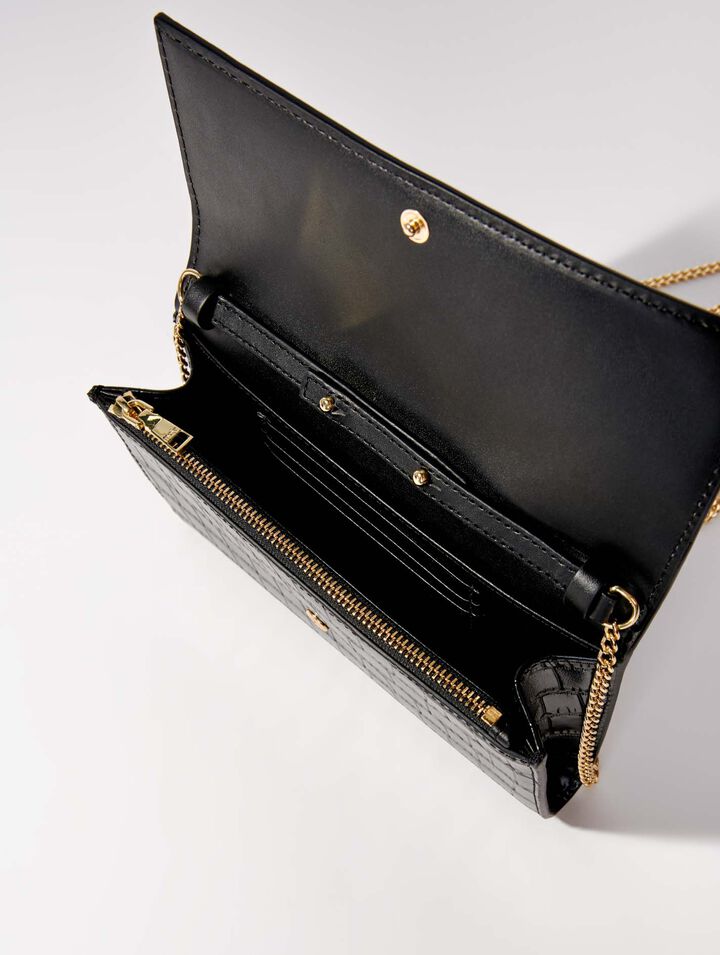 Croc-effect embossed leather bag