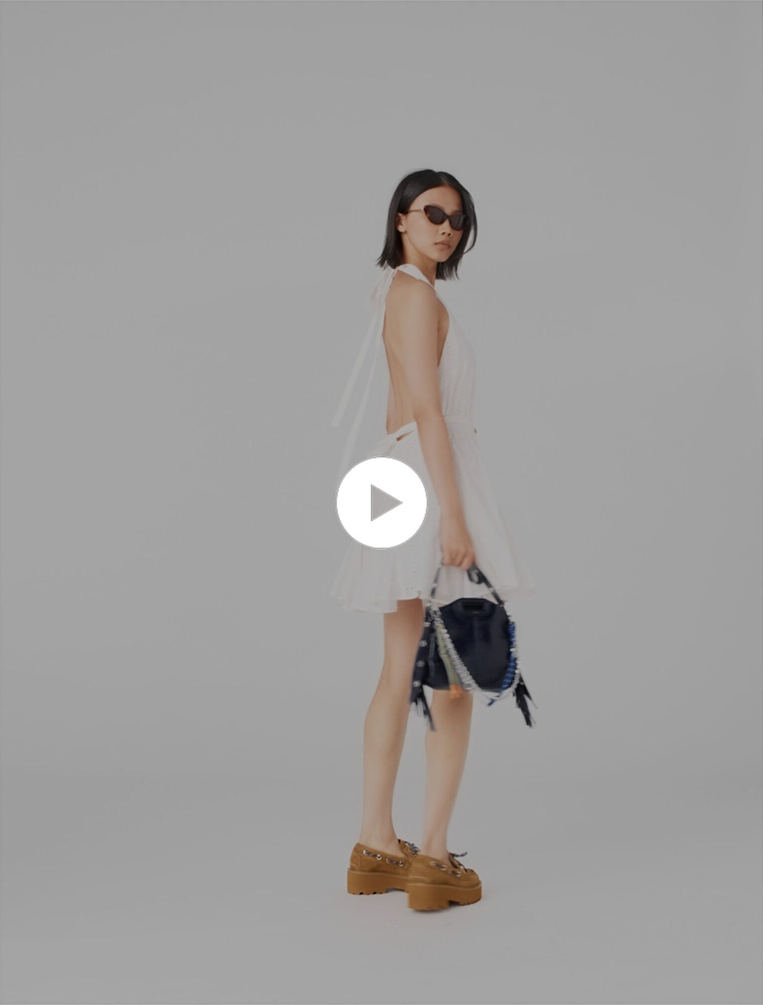 Short embroidered backless dress